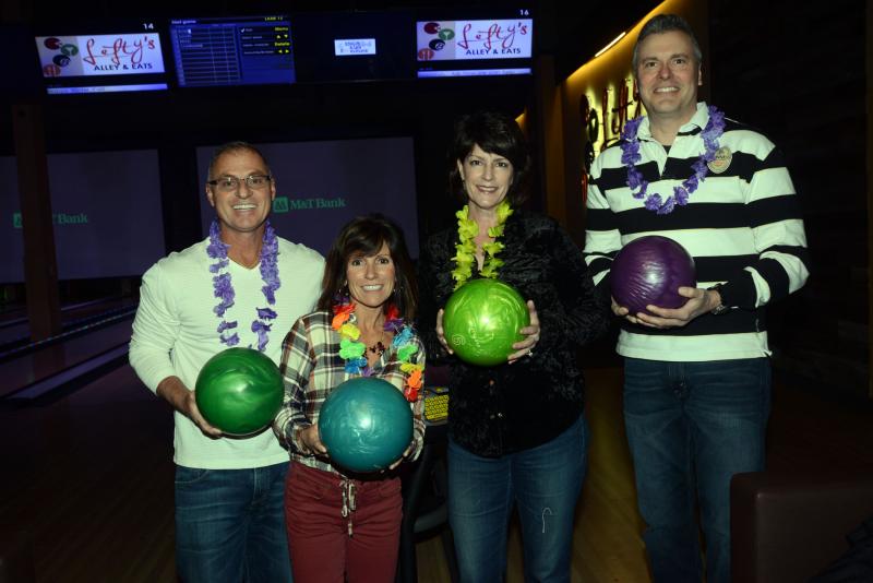 The Neighbors Team is ready for some neighborly competition. Shown are (l-r) Dave and Rose Furio and Charmaine and Brad Thomas. RB Boys and Girls Club