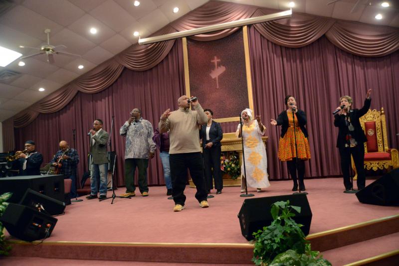 The Trinity Faith Praise and Worship Team started the program under the leadership of A.J. Jones, front. Shown are (l-r) Andre Jones, Lloyd Griffin, Wescenia Wise, Yvonne Kennedy, Lu Dickerson, Jymace Wescott and Teri Dukes. TFCC Black History
