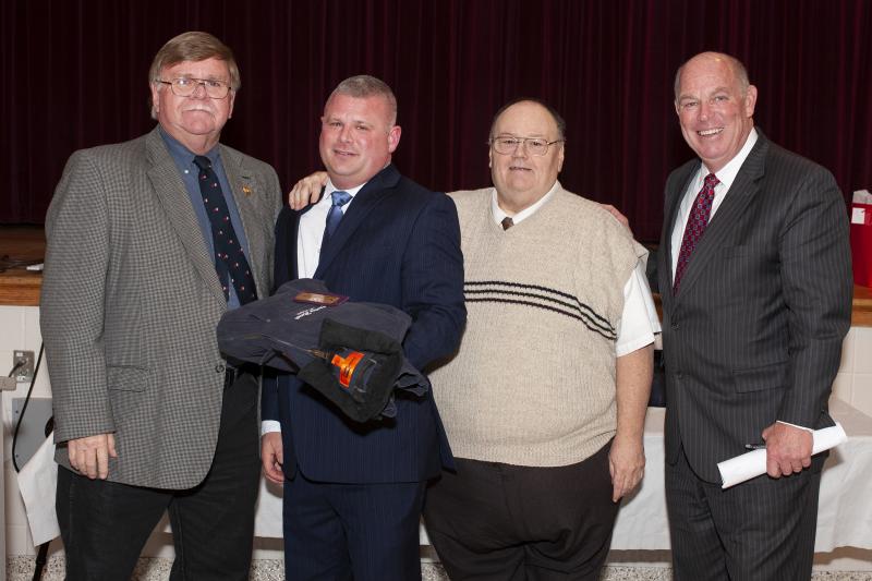 New Life Member Chatham Marsch, second from left, was presented with his award from Fire Chief Chuck Snyder, left, President Dan Mitchell and Speaker of the House Rep. Pete Schwartzkopf, D-Rehoboth, who was master of ceremonies.