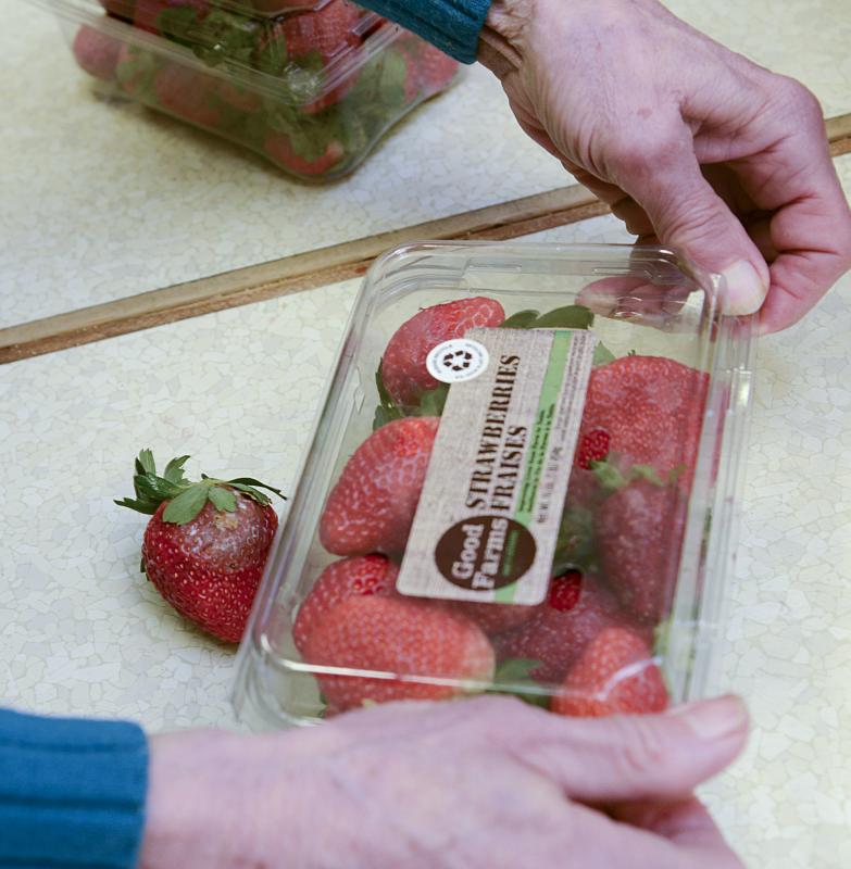 Fresh fruit is inspected for any rotting items which will then be put in bags for families to enjoy.