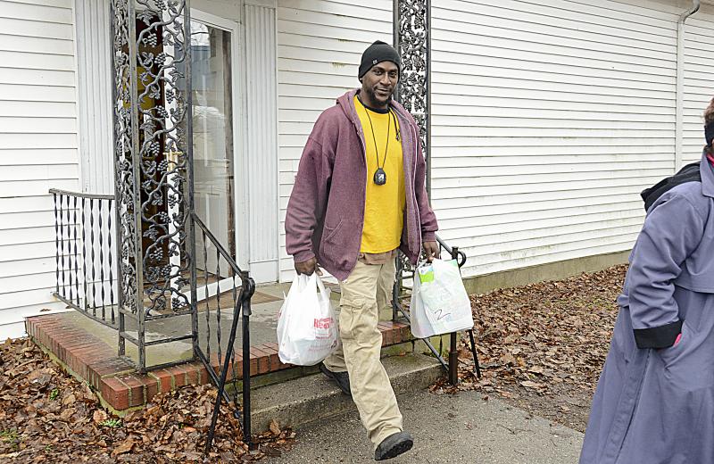 Larry Banks helps on Monday at the pantry, “If I didn’t show up I am afraid I would disappoint the ladies,” he said.