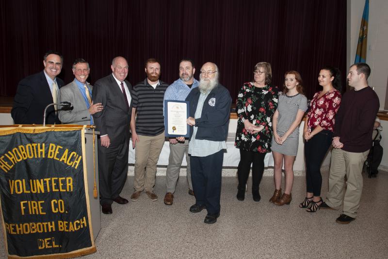 50-year-member Sudler Dill is shown with his family after being recognized by Sen. Ernie Lopez, R-Lewes, Rep. Steve Smyk, R-Milton/Lewes, and Speaker of the House Rep. Pete Schwartzkopf, D-Rehoboth.