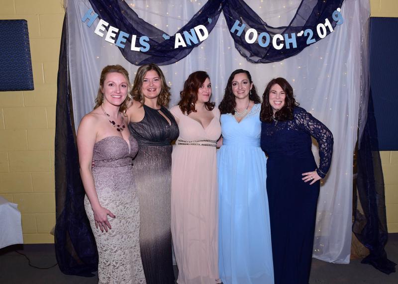 Getting their formal photo taken are Missie White, left, Sara Hudson, Diane Buonopane, Marley Costango and Michelle Keenan.