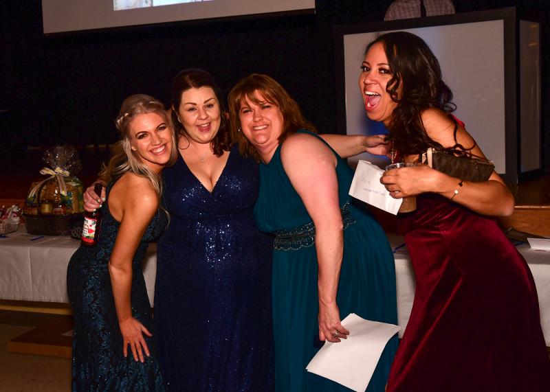 Having a great time on the dance floor are Taylor Hughes, left, Reinie Thompson, Samantha Hudran and Amber Brumfield.