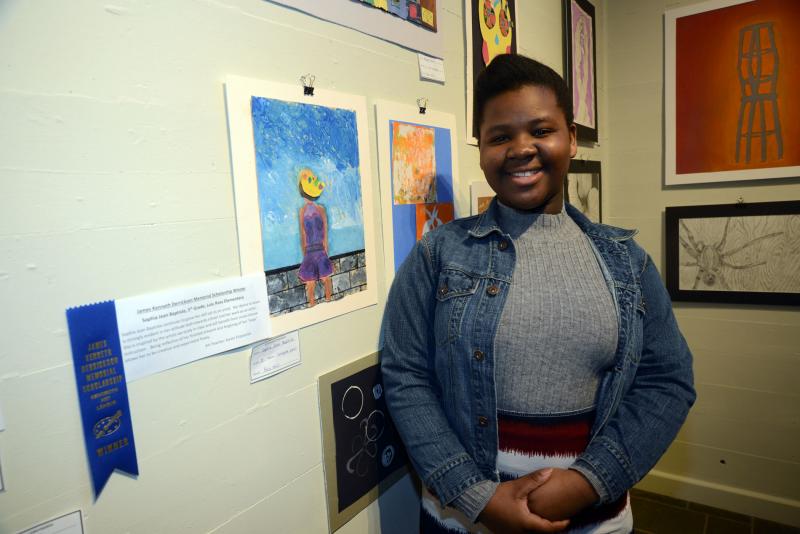 Sophia Jean Baptiste from Lulu Ross Elementary won a James Kenneth Derrickson Memorial Scholarship for her tempura paint figure. This scholarship allows students to take art classes at the Rehoboth Art League for one year, tuition free. Young at Art