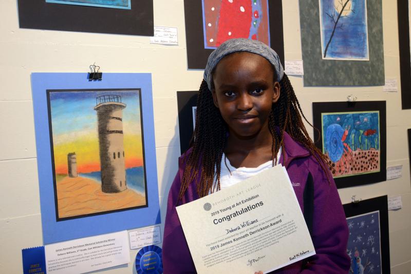Debora Williams, a student at East Millsboro Elementary, received a James Kenneth Derrickson Memorial Scholarship for her interpretation of the WWII fire control towers in chalk pastel. Young at Art