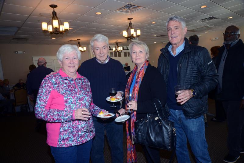 Socializing with friends at the event are (l-r) volunteer Mary Jo Venerus, Joe Venerus, volunteer Mary Ellen Kenney and Larry Kenney. CRC Seeds of Change