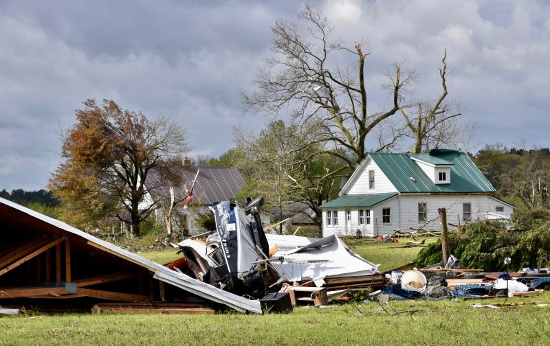 A barn and house off Firetower Road east of Laurel are damaged by a possible tornado. RON MACARTHUR PHOTO