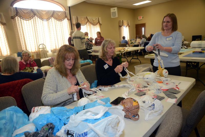 Crocheting the the sleeping mats are (l-r) Raychel Estep, Ranette McCall and Sleeping Mat Project organizer Linda Mason. Both Estep and McCall came from Middletown to help with the various projects. STEVN BILLUPS PHOTOS 55Plus