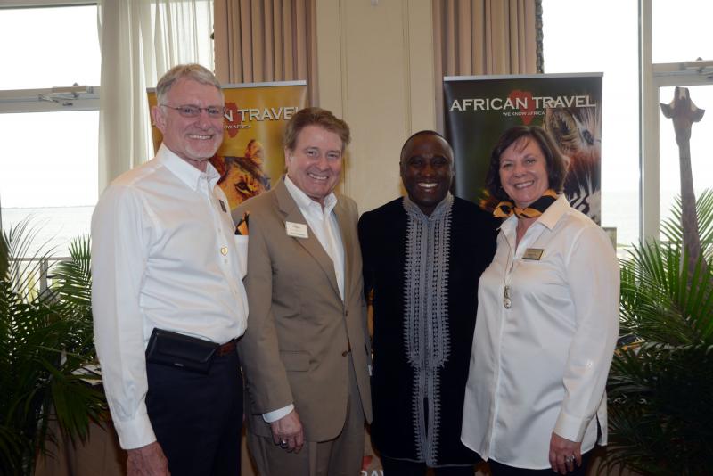 Accent on Travel owners Rick Stellhorn and Annette Stellhorn stand in front of presenting sponsor African Travel’s booth. Shown are (l-r) Accent on Travel co-owner Rick Stellhorn, African Travel Sales Manager David Schwenk, African Travel President Sherwin Banda and Accent on Travel co-owner Annette Stellhorn.