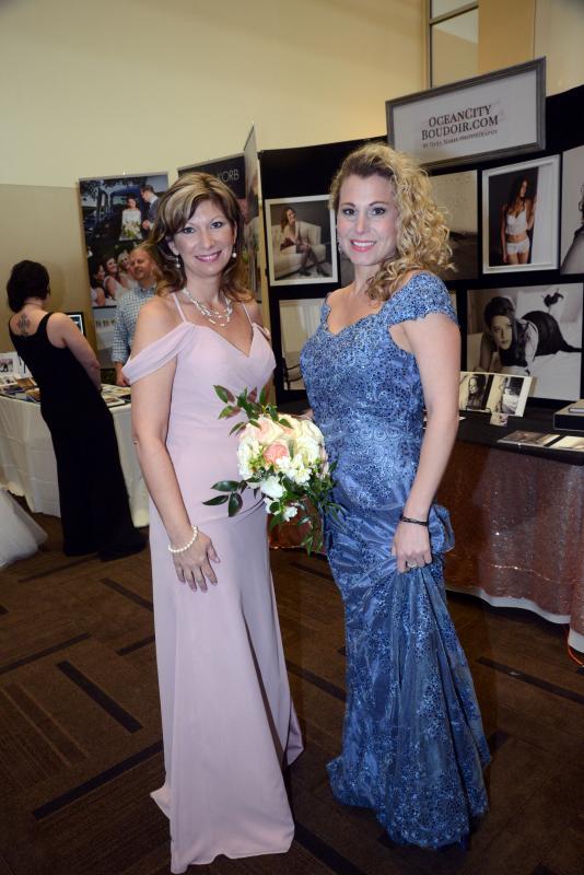 Modeling the bridesmaids or mothers dresses for Candlelight Bridal are Tish Withers, left, and Alyson Genco. Bridal Expo