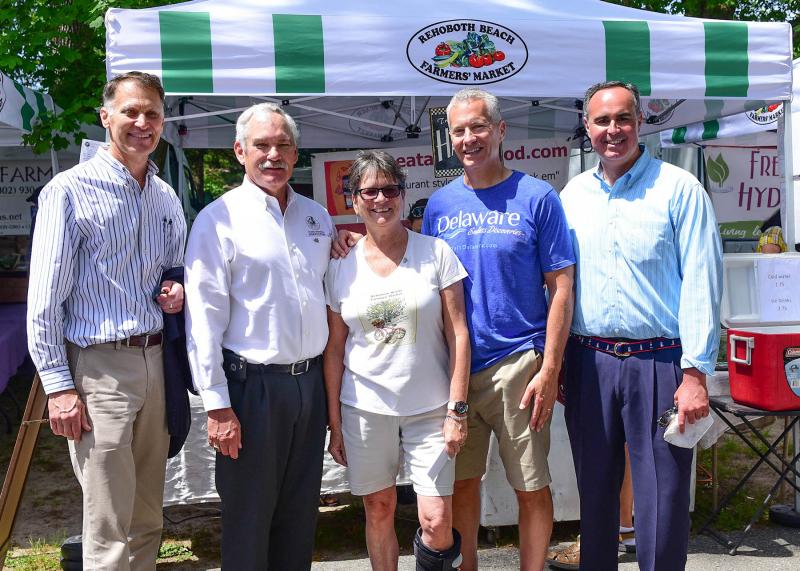 Kicking off Delaware Grown Week at the Rehoboth Beach Farmers Market are (l-r) Rep. Ronald Gray, R- Selbyville; Delaware Secretary of Agriculture Michael T. Scuse; Rehoboth Beach Farmers Market Manager Pat Coluzzi; Rep. Lyndon Yearick, Camden-Wyoming; and Sen. Ernie Lopez, R-Lewes.