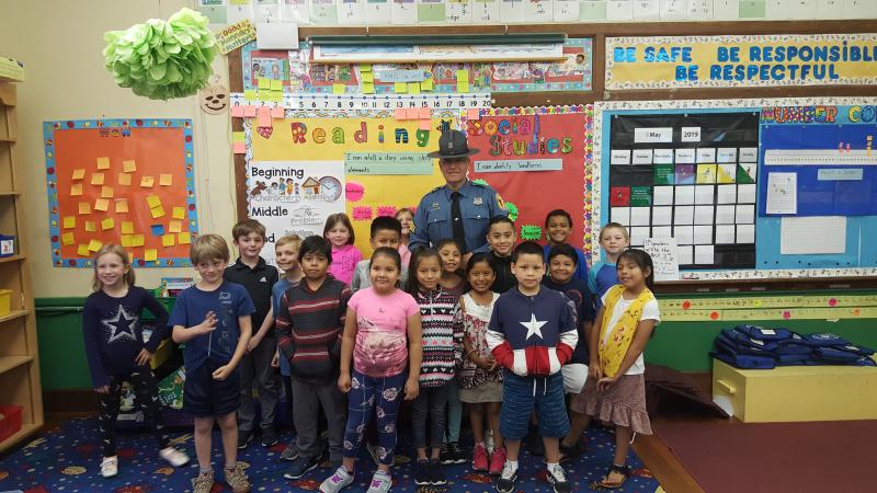 Posing for a photo with DSP Sgt. Tony Mendez are second-graders from Olga Tigue’s classroom (l-r) Grace Anderson, Holden Lehne, Gavin Morris, Chase Reifsnyder, Vadhir Garcia-Garcia, Hannah McCabe, Juan Baltazar-Villagomez, Cristel Topaz-Castillo, Riley Windish, Cindy Roblero-Perez, Angie Velasquez, Aremy Perez-Roblero, Rylan Esparza, Anthony Menjivar, Isaiah Cantu, Cameron Price, Colin Gora and Elizabeth Martinez-Baltazar. SUBMITTED PHOTOS