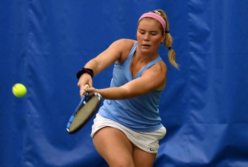 Cape senior second singles Amanda Sponaugle makes a backhand shot in her semifinal loss to Caesar Rodney’s Katherine Tamesis.