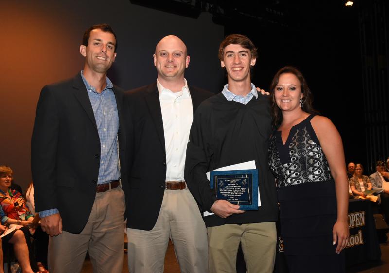 Luke D'Ambrogi accepts his award with (l-r) Bryan Mack and Franc Cook of the Scott Brozey Lead by Example Memorial Scholarship, and Cape Principal Nikki Miller.