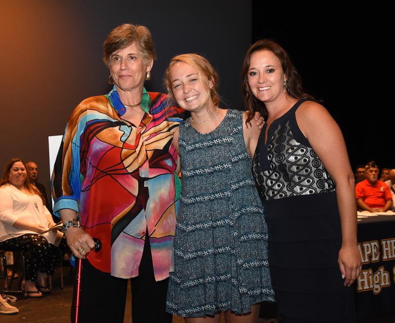 Erin Cannon, center, is shown with Ellen Passman of the Women’s Club of Milton and Cape Principal Nikki Miller, right.