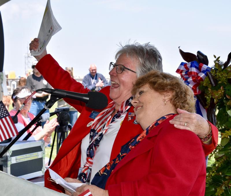 Post 17 Auxiliary President Murt Foos, left, and Veterans Affairs Chairwoman Kellie Bergen express their gratitude for the efforts given to get the wall to Lewes.