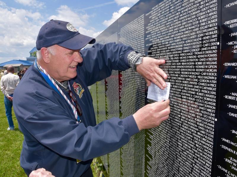 Joe Peltz, a Cape May-Lewes Ferry worker, takes an etching of two Army helicopter pilots who saved his life. He served in Vietnam from 1970 to 1971.