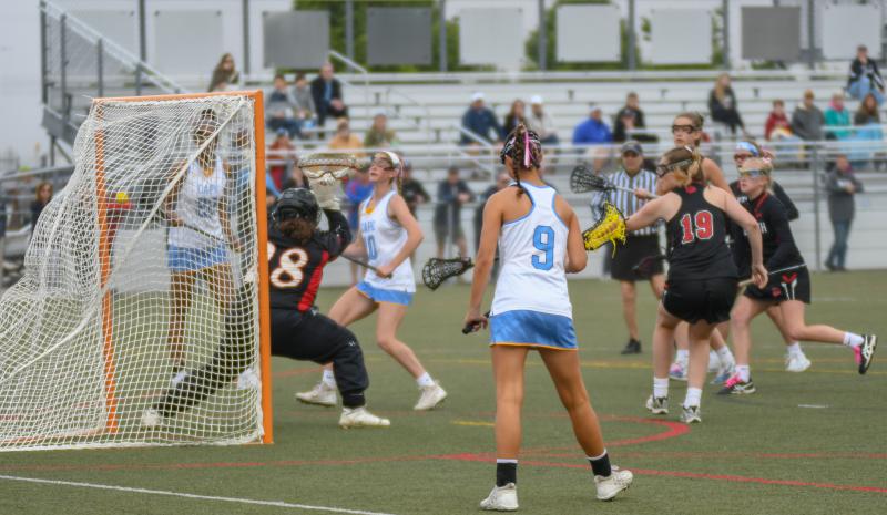 Emily Monigle scores the first of her four goals.