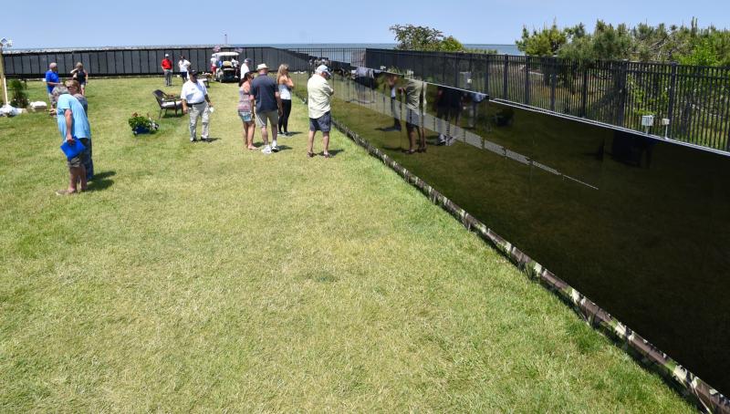 The Vietnam Veterans Moving Wall, a one-half-size replica of the memorial in Washington, D.C., is 250 feet long on each side. The wall was on display at the Cape May-Lewes Ferry Terminal.