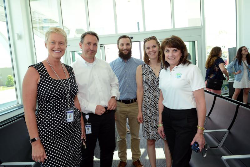 Plenty of DART employees were on hand to explain the features of the transit center. Shown are (l-r) Transportation Secretary Jennifer Cohan, DART Senior Planner David Dooley, Junior Planner Jared Kauff, Deputy Transportation Secretary Nicole Majeski, and Chief Customer Experience Officer Julie Theyerl. DART Transit Center