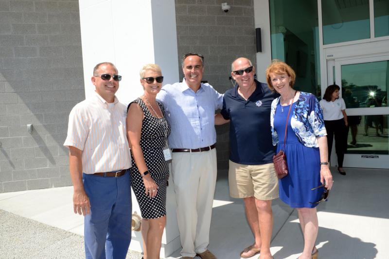 Local and state officials were happy to see the transit service up and running. Shown at the open house are (l-r) Southern Delaware Tourism Executive Director Scott Thomas, Transportation Secretary Jennifer Cohan, Sen. Ernie Lopez, R-Lewes; Rep. Pete Schwartzkopf, D-Rehoboth Beach; and Lewes Chamber of Commerce Executive Director Betsy Reamer. DART Transit Center