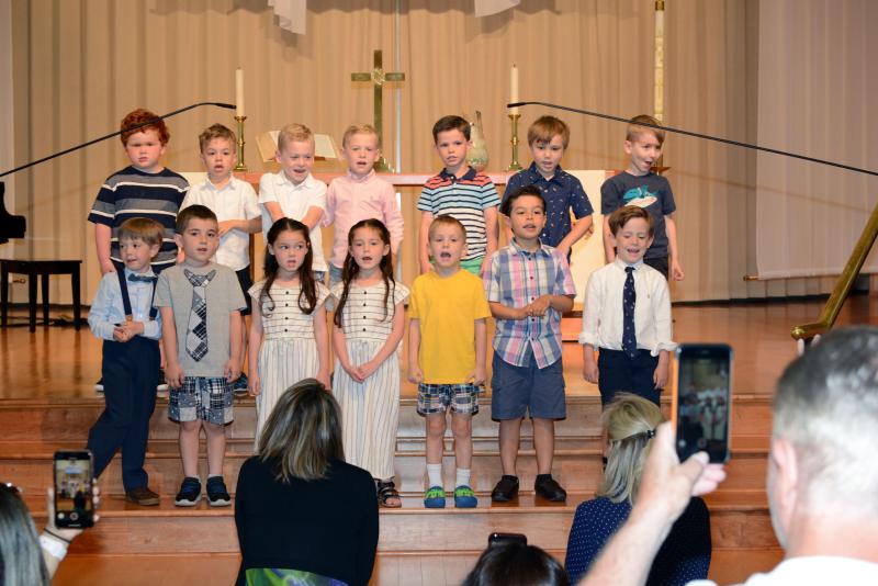 The Pelican class, performing for the last time as preschoolers, are in back (l-r) Hunter Cosme, Lucas Rodrigues, Max Subity, Ty Subity, Grayson Graviet, Christian Mailey and Race Benzakin. In front are Jameson Kotch-Jester, Leo Dialektakos, Chloe Coursey, Vivian Coursey, Jax Taglienti, Andrei Tobias and Sam Bouloucon. Epworth Preschool Graduation