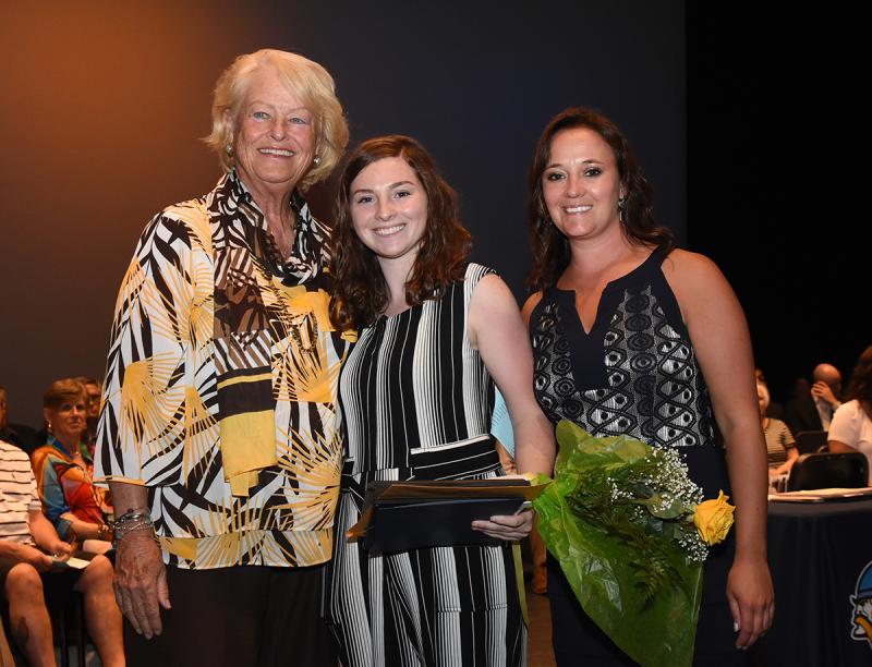 Vienna Iacona accepts her award with Michelle Rollins of the Horatio Alger State Scholar Award and Cape Principal Nikki Miller.