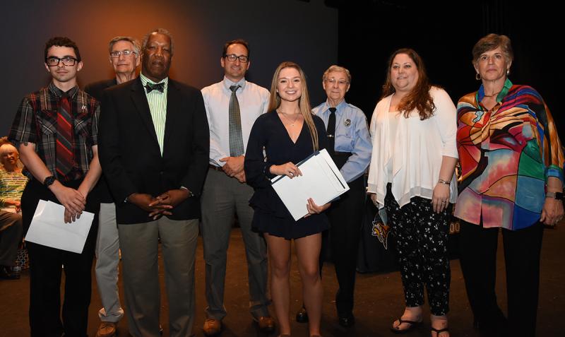 Isabella Leishear, center, is shown with (l-r) Brandon Holston of McDonald’s, Paul Carey of Lewes-Rehoboth Rotary, Randy Smith of Rehoboth Beach Sunrise Rotary, Mike DiPaolo of Delaware Community Foundation, Caddie Joseph of the Lewes Fire Department T.A. Shipley Scholarship, Mary Ellen Kiernan of the James J. Kiernan Memorial Scholarship and Ellen Passman of the Women’s Club of Milton.