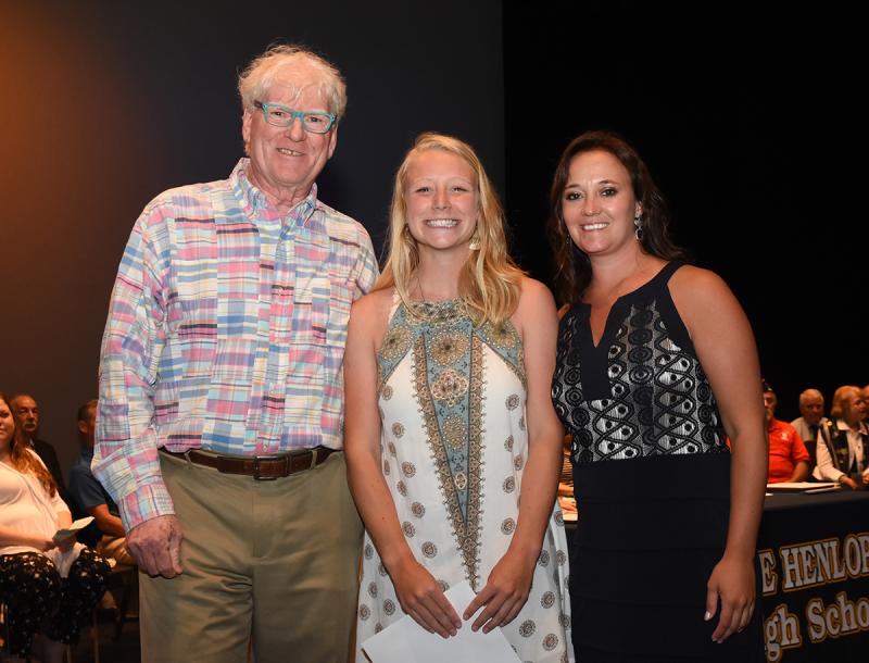 Lindsey Reynolds, center, is shown with Bill Schab of the Maureen Schab Fund and Cape Principal Nikki Miller.