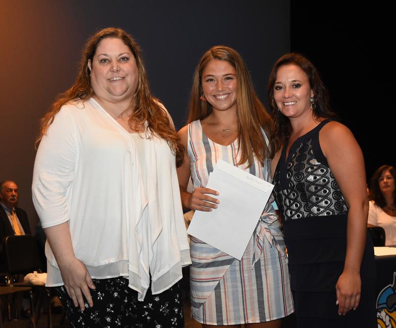 Taylor Smith is shown with Mary Ellen Kiernan of the James J. Kiernan Memorial Scholarship and Cape Principal Nikki Miller.