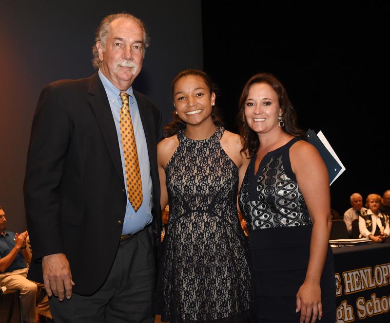 Karissa Worley is shown with Lou Norbeck of the Lou Norbeck Student-Athlete Scholarship and Cape Principal Nikki Miller.