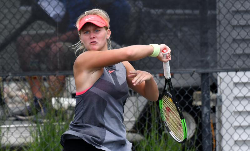 Peyton Stearns powers a forehand. She fell in a four-hour match to Petia Arshinkova of Bulgaria 6-7, 7-6, 7-6.