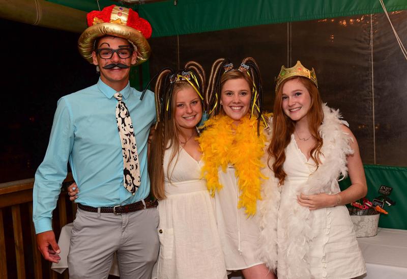 Having a blast with the after-commencement party photo booth are (l-r) Dylan Kaplan, Shelby Frye, Morgan Schwab and Maci Silicato.