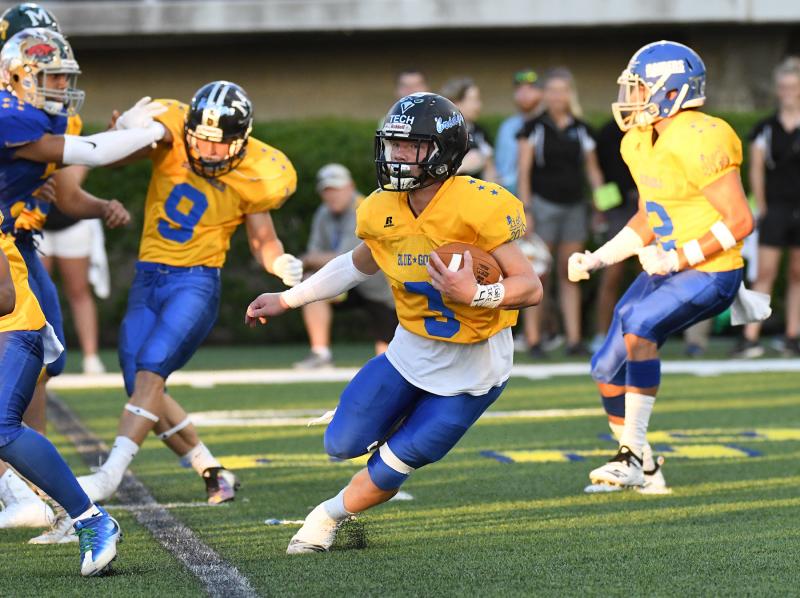 Trey Hatfield of Sussex Tech, right, puts a move on Blue’s Dayton Swanhart of Newark High.