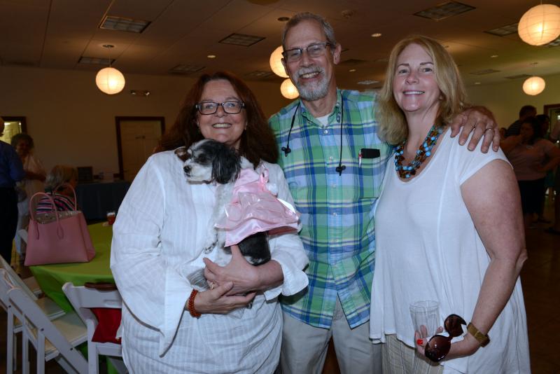 Meeting new friends are (l-r) Donna-Marie Artuso with Haley, and Michael and Janet Dorman. DHA Wags. Whiskers and Wine