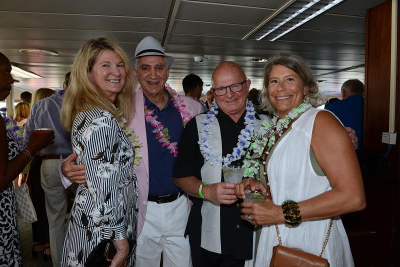 Enjoying the VIP reception are (l-r) Cindy and John Abood, and Marvin and Lyn Snyder. Beebe Beach Bash