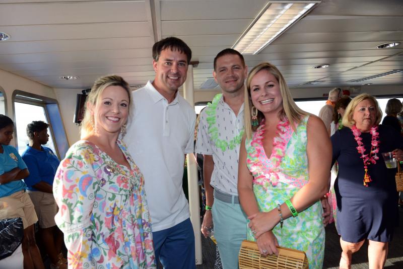 Having fun at the event are sponsors Mindi and Robert Tunnell, and Derek and Christin Charles. Beebe Beach Bash