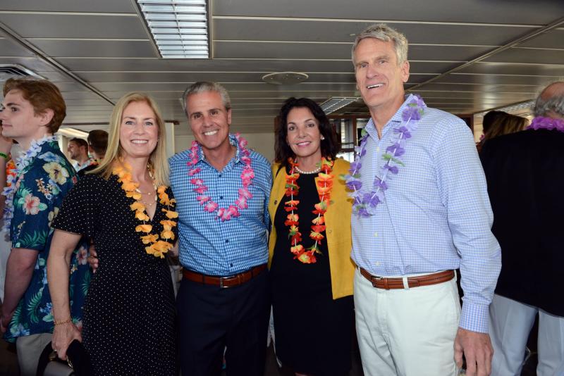 Having fun despite the tight space upstairs are (l-r) Anne Michele Kuhns, Beebe Healthcare board member Mike Meoli, State Auditor Kathy McGuiness and Rehoboth Beach Mayor Paul Kuhns. Beebe Beach Bash