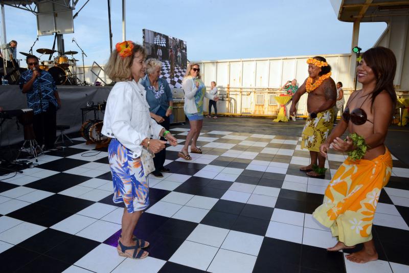 Tino’s Hawaiian Entertainment brought dancers and musicians from Cape May. Two of the dancers were teaching Hula to some brave volunteers. Hula students are (l-r) Chris Phillips, Bea Johnson and Erin Walls. Beebe Beach Bash