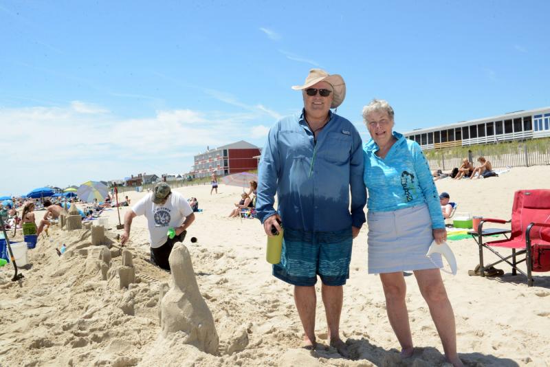 Event organizers Darrell O’Connor and Marilyn Seitz and many volunteers spent the morning on the beach sculpting sandcastles. Longest Sandcastle