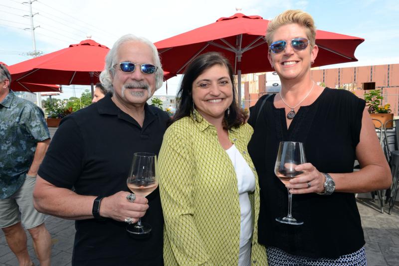 Enjoying some complimentary wine are (l-r) event sponsor Ray Kurz, volunteer Anita Broccolino and volunteer Andrea Vennell. So Del Fest 2019