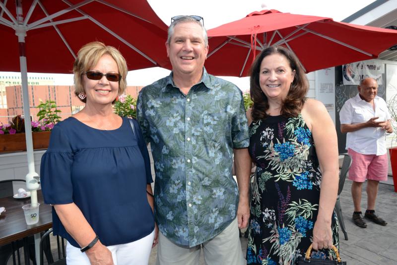 Enjoying the cool evening are (l-r) Friend of Beau Biden Foundation’s Allison Reardon, Beau Biden Foundation volunteer Joe Agosti, and Cathy Melfi. So Del Fest 2019