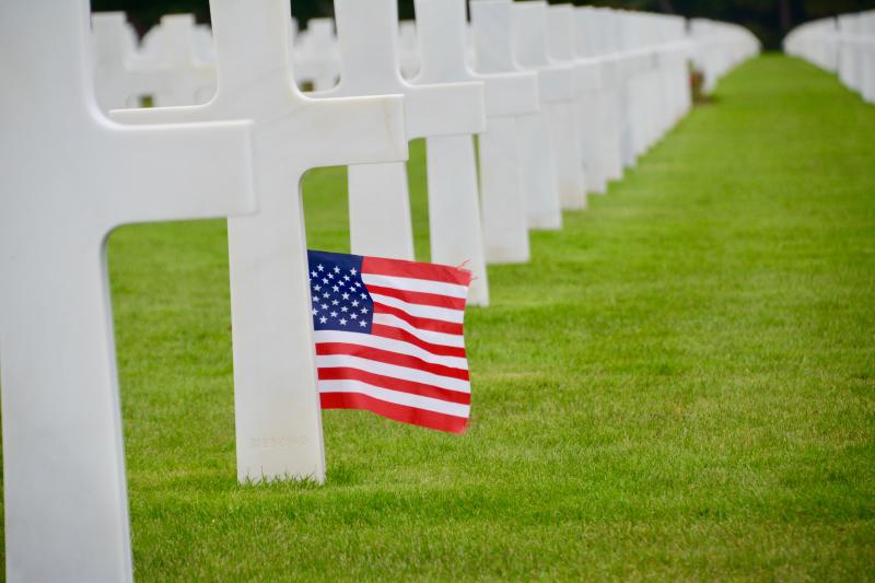 Lines of white Italian marble crosses are in contrast with the green grass of the Normandy American Cemetery in Colleville-sur-Mere on the coast.
