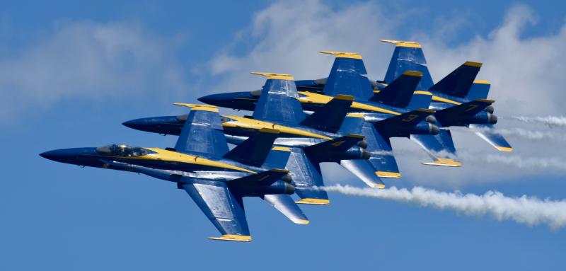 Four of the six Blue Angels separate from the other two jets. They fly as close as 18 inches apart during the Diamond 360 maneuver.