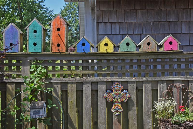 MaryAnn Etu’s garden has been described as whimsical. While small, it’s packed with colorful decorations and artwork and a mix of plants.