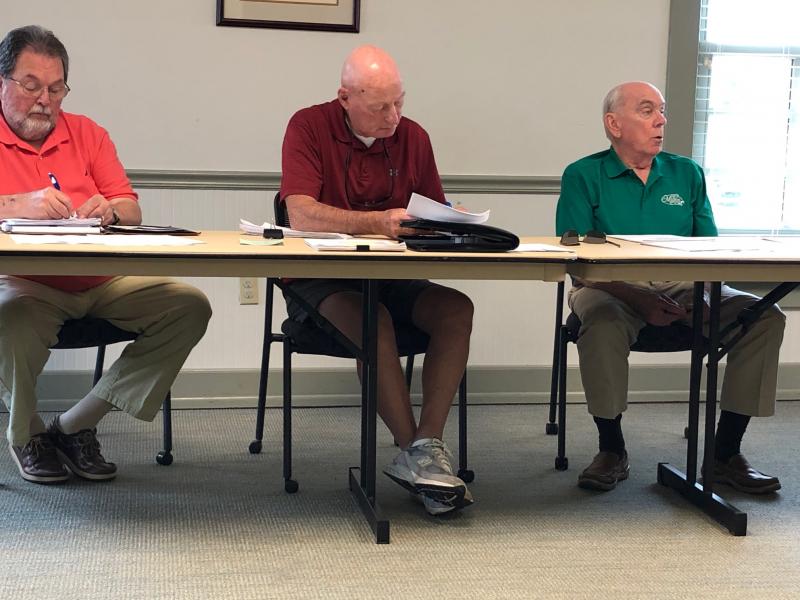Milton Water Committee is discussing two new water infrastructure projects intended to improve flow and prepare for future development. Design work is nearly complete on replacing mains at Atlantic Avenue and along Chestnut Street, while planning is underway for replacing the water main from Atlantic Street to Cave Neck Road. Participating in discussion at the committee’s June 12 meeting are (l-r) Councilman Michael Cote, Chairman Jack Bushey and Councilman Sam Garde. RYAN MAVITY PHOTO