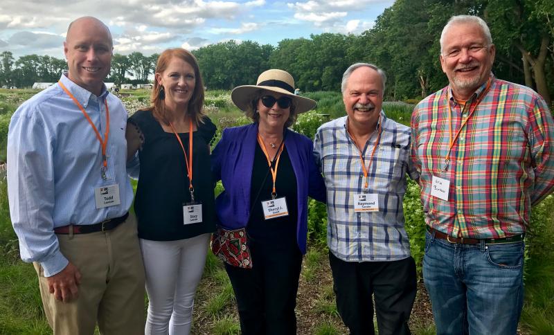 The 30-plus acre parcel of land that is home to Delaware Botanic Garden was preserved by Sussex County Land Trust in partnership with Sussex County Council. On hand for the Sip and Saunter event are (l-r) Sussex County Administrator Todd Lawson, his wife Stacy, Delaware Botanic Garden Executive Director Sheryl Swed, Delaware Botanic Garden Board President Ray Sander, and Sussex County Councilman I.G. Burton.