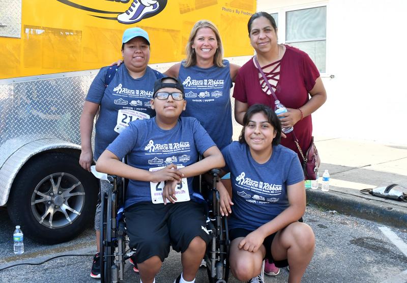 Local students fighting cancer are Miguel Robledo-Mendez and Jackeline Olivas-Marin. They are shown with their mothers Yadira Robledo and Aracely Olivas-Marin, and race organizer Stephanie Shuttleworth. DAN COOK PHOTOS