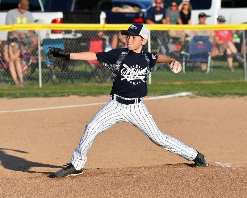 Milton starting pitcher Liam Mitchell delivers to the plate in the 14-12 loss to Laurel. DAN COOK PHOTOS